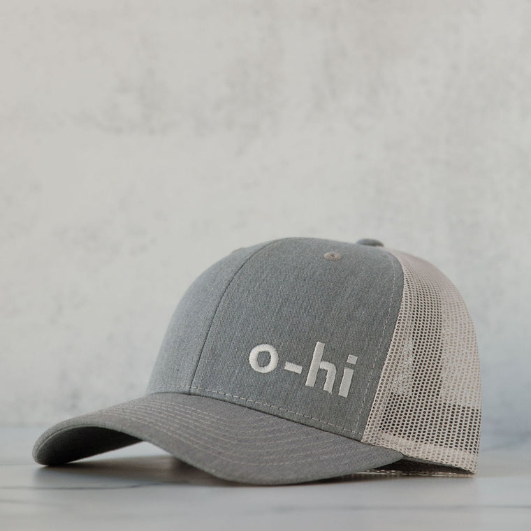 A gray o-hi baseball cap with a breathable mesh fabric and an adjustable back strap.