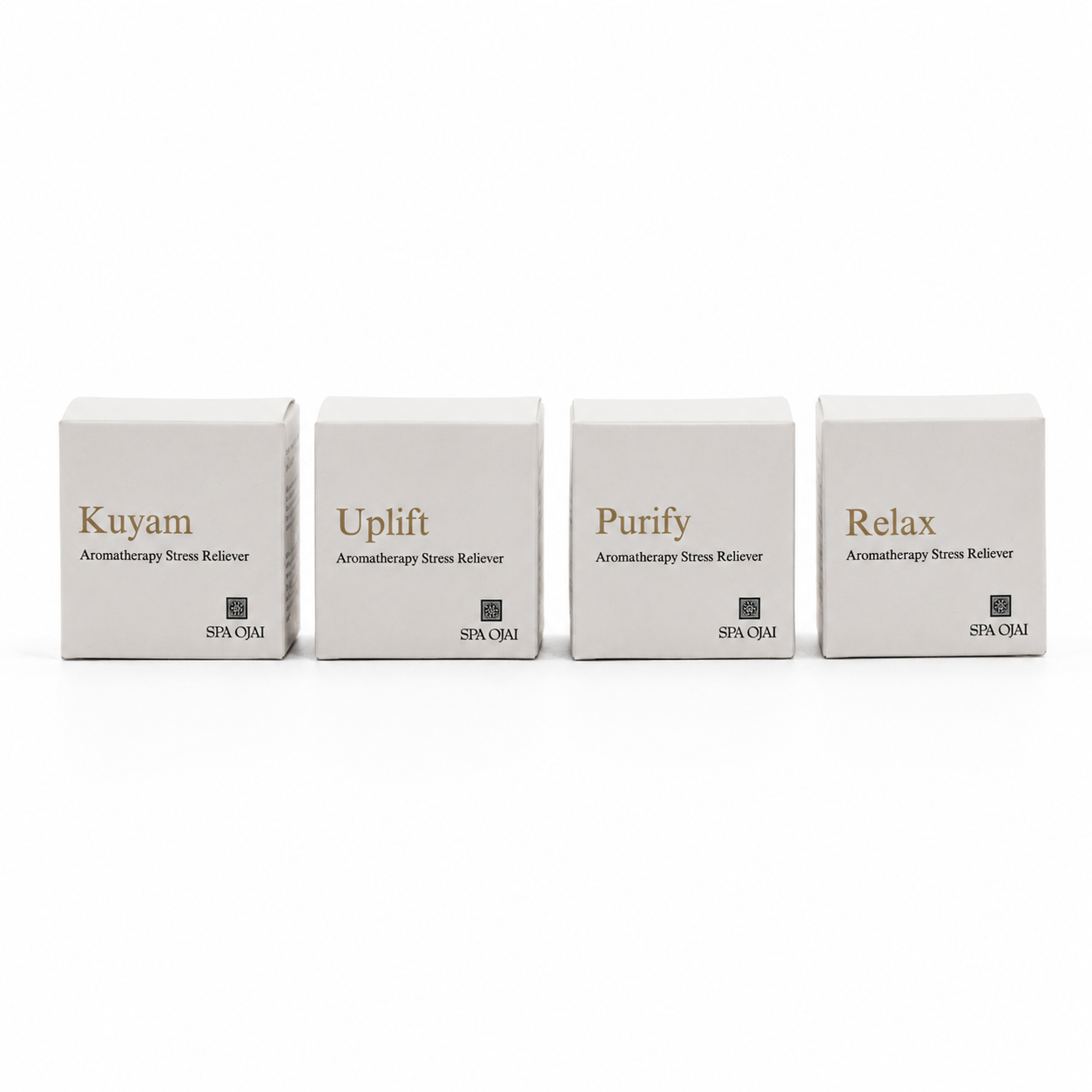 Four white rectangular boxes for SPA/CMAI aromatherapy stress relievers, labeled Kuyam, Uplift, Purify, and Relax, arranged in a row on a white background.