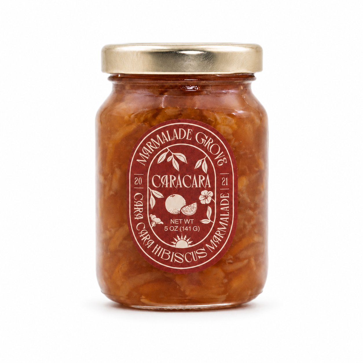 A glass jar of Marmalade Grove Caracara organic hibiscus jam with a gold metal lid and a red circular label, set against a plain white background.