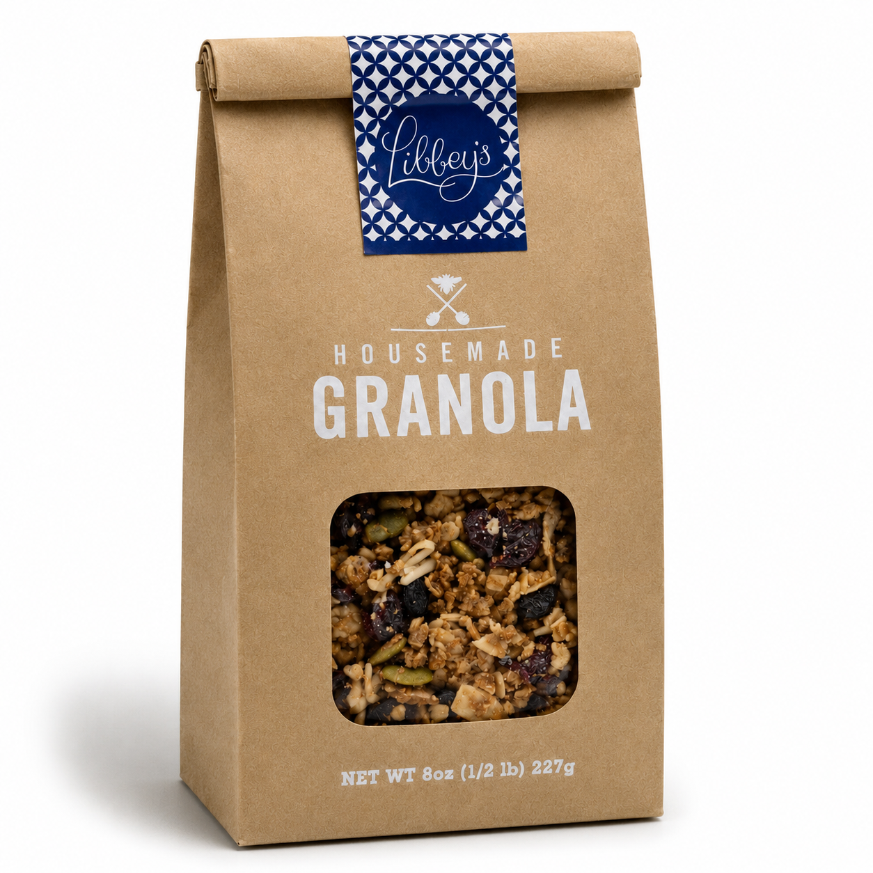 A kraft paper bag of Libbey's Housemade Granola with a clear window showing the granola inside, set against a plain white background.