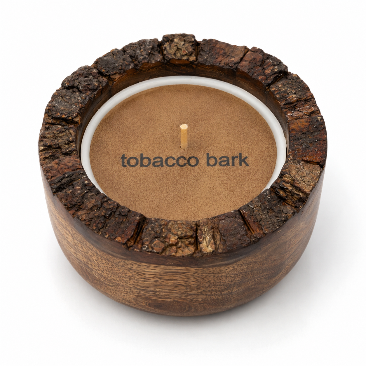 A single-wick candle with a natural tobacco bark holder, featuring a textured dark brown bark rim and a smooth wood base, with the scent name 'tobacco bark' printed on the tan wax surface.
