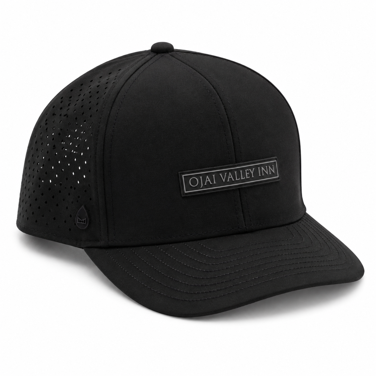 A black structured baseball cap with perforated side panels, a curved brim, and a front patch reading 'OJAI VALLEY INN'.