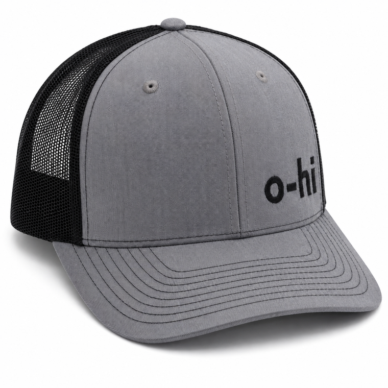 A gray and black trucker cap with a curved brim, featuring black mesh back panels and black embroidered 'o-hi' lettering on the front.