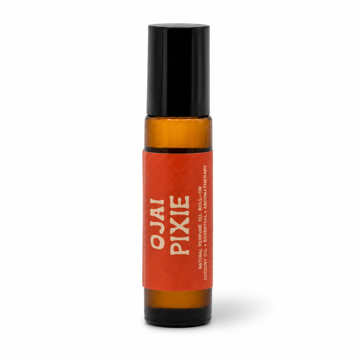 An amber glass roll-on bottle with a black cap and a bright orange-red label reading 'OJAI PIXIE' in cream text, shown on a clean white background.