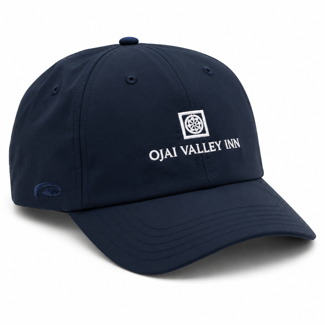 A navy blue baseball cap with white embroidered text reading 'OJAI VALLEY INN' and a small square logo on the front, shown on a clean white background.