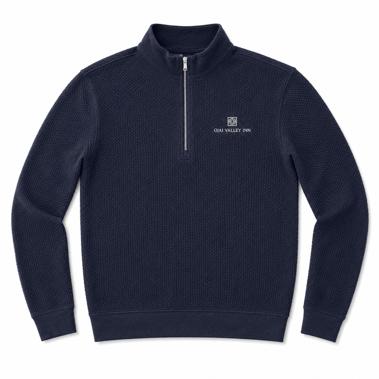 A navy blue textured quarter-zip pullover sweatshirt with a small white embroidered logo and text on the left chest, displayed on a clean white background.