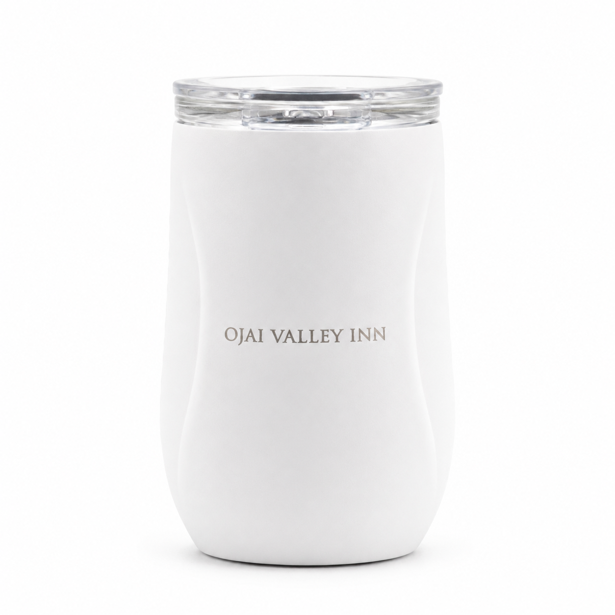 A white insulated tumbler with a clear lid, featuring the text 'OJAI VALLEY INN' printed in a metallic gold font on the front, set against a plain white background.